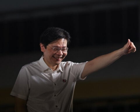 Singapore PM urges voters to re-elect his cabinet to deal with US, China