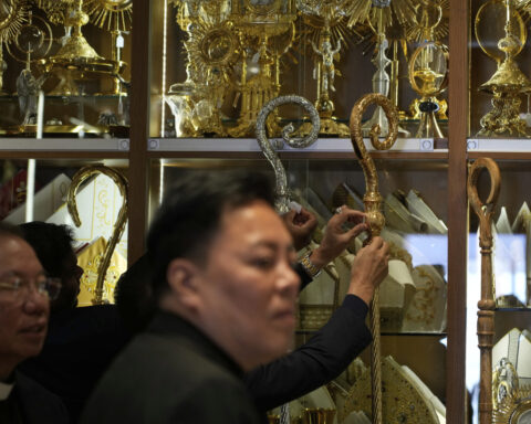 These papal tailors aren't expecting a traditional order for new cassocks to outfit the next pope
