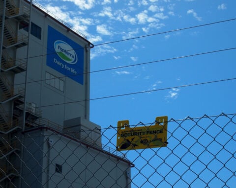 Meiji, Lactalis, Saputo, Warburg may bid in Fonterra's $2.4 billion sale, sources say
