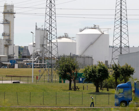 Air Products lowers full-year profit forecast, shares fall