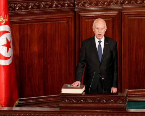 Tunisia leader's opponents, supporters stage rival rallies in sharp political split