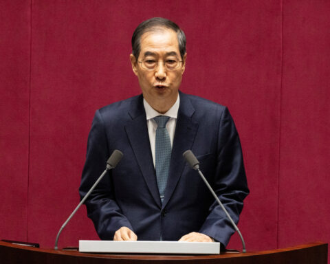 South Korea approves bigger extra budget of $9.7 billion as economy falters