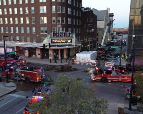Man charged with setting fire outside downtown theatre said he just flicked a cigarette