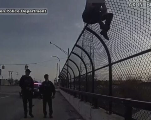 Body camera footage shows Warren police officers save suicidal man from overpass