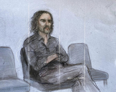 Russell Brand granted conditional bail after appearing in London court on rape and assault charges