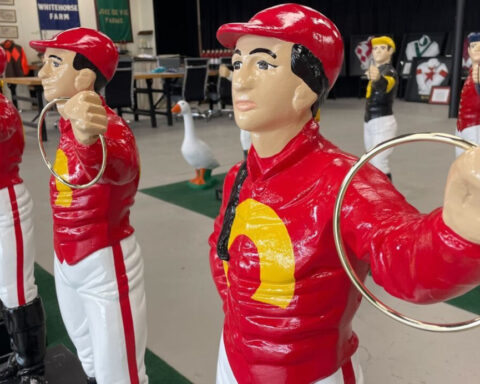 Central Kentucky woman expands custom lawn jockey business