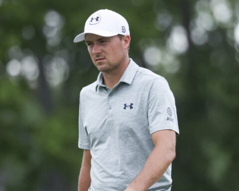 Scottie Scheffler leads at 18 under through 36 holes after long weather delay at the Byron Nelson