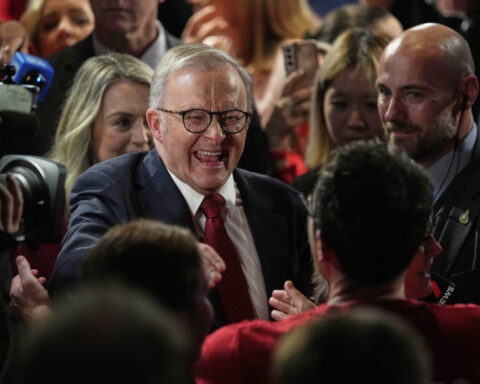 Australia's re-elected prime minister says voters chose unity over division