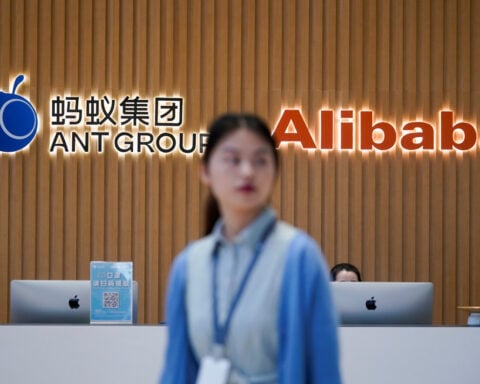 China's Ant Group plans to list overseas unit in Hong Kong, report says