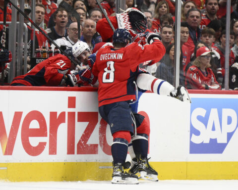 Alex Ovechkin leads the Capitals into the second round against Carolina by scoring and hitting