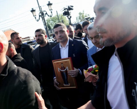 Romanian hard-right candidate Simion leads presidential election, exit polls show