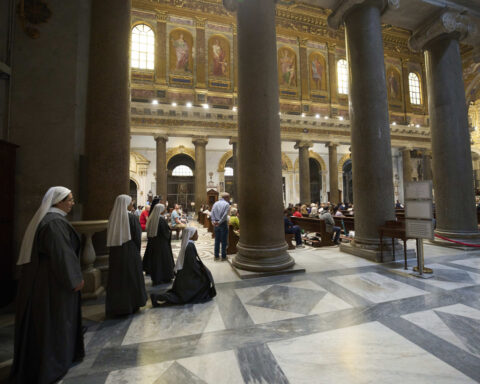 At Mass in housing projects and tourist hotspots, Romans pray next pope focuses on poverty and peace