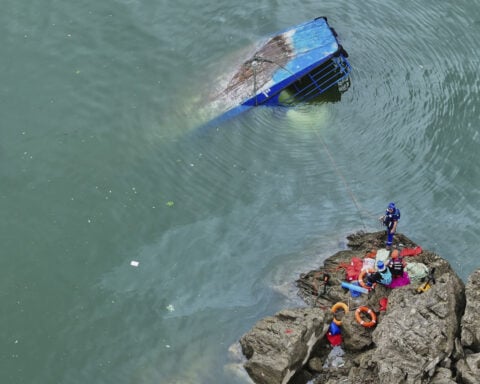 Tourist boats capsize in sudden storm in southwest China, leaving 10 dead