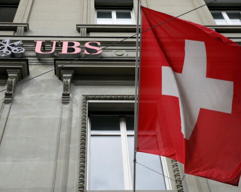 Credit Suisse to pay $511 million as part of agreement with US DOJ in tax case