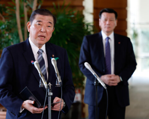 Threatened by Trump tariffs, Japan walks a delicate tightrope between US and China