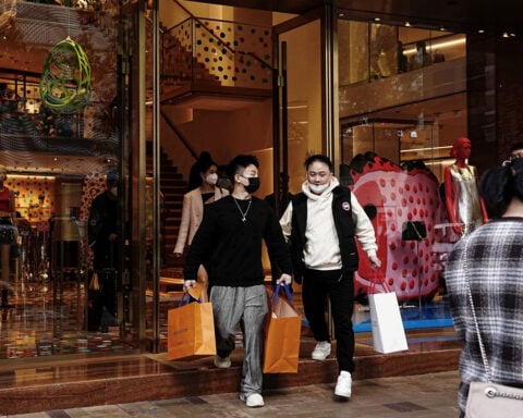 China's services growth hits 7-month low as tariffs bite, Caixin PMI shows