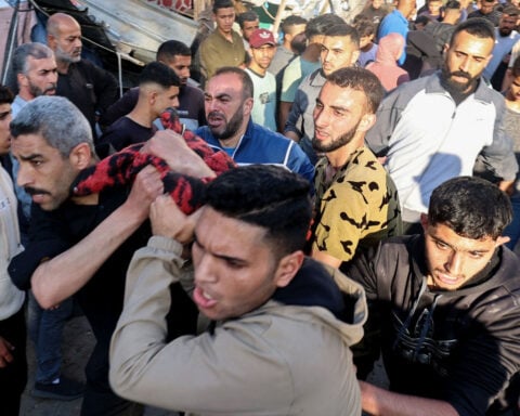 Israeli strikes kill 48 at Gaza shelters for displaced Palestinians, hospitals say, as military operation intensifies