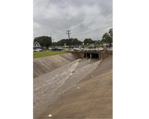 Rescue crews recover the body of a 10-year-old girl lost in Texas floods
