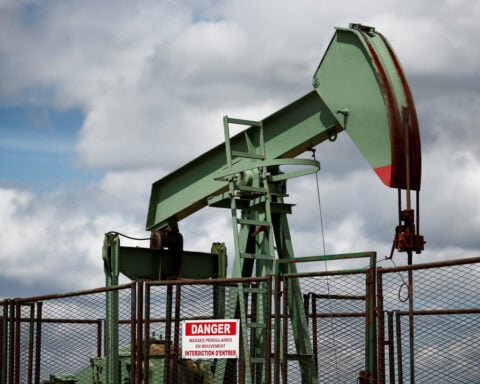 Oil settles lower as hopes dim for US-China trade and supply worries ease