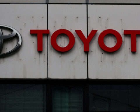 Toyota's earnings buffered by demand for its hybrids, but US tariff hit looms