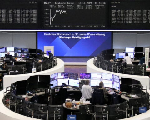 European shares slip as investors assess earnings, await Fed rate decision