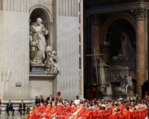 What is a Roman Catholic conclave and who takes part?