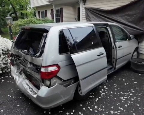 Tesla in autopilot crashes into van parked in driveway, driver ticketed for careless driving