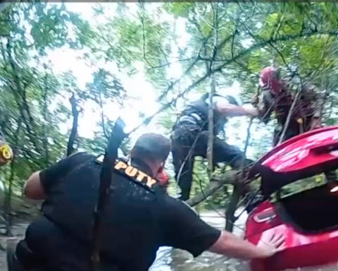 Man saved from creek, rising floodwaters