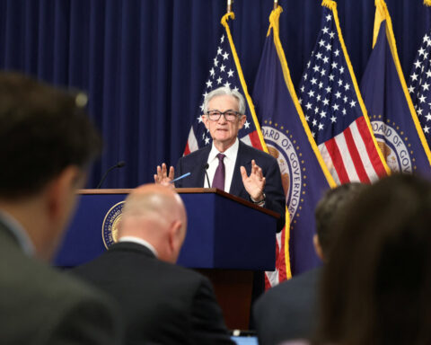 Stocks rise in choppy trade after Fed keeps rates unchanged