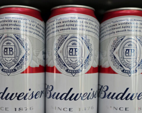 Brewer AB InBev's profit surges ahead of forecasts, shares rise