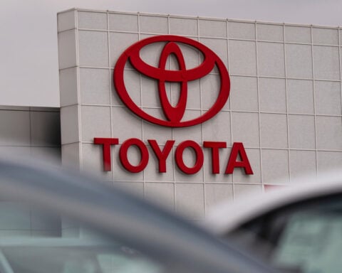 Toyota reports booming sales but stays cautious on profit because of various costs