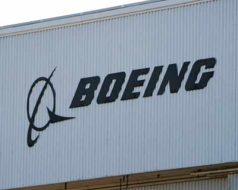 Britain's IAG to buy Boeing and Airbus jets, sources say