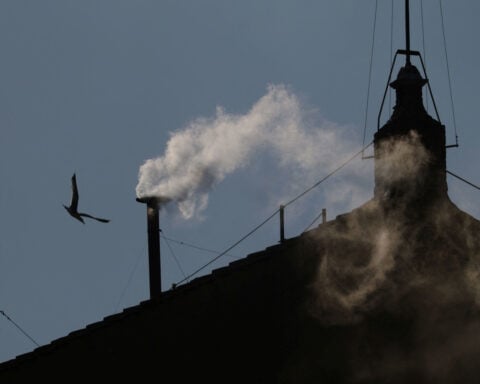 : WHITE SMOKE FROM SISTINE CHAPEL SIGNALS POPE CHOSEN