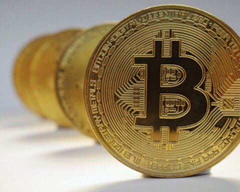 Bitcoin tops $100,000 on trade deal optimism
