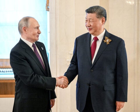 China, Russia vow to strengthen cooperation on international law matters, state media reports