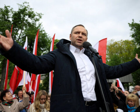 Polish opposition presidential candidate takes poll hit over apartment deal