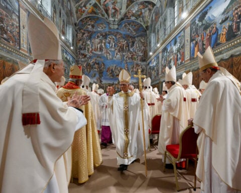 Cardinal Prevost put his head in his hands as papacy loomed