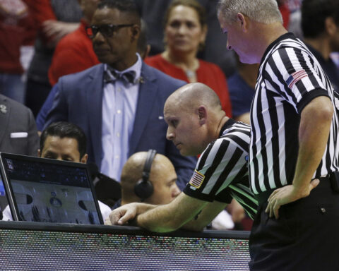 Out-of-bounds plays could be reviewed only by coach challenge under NCAA rules panel recommendation