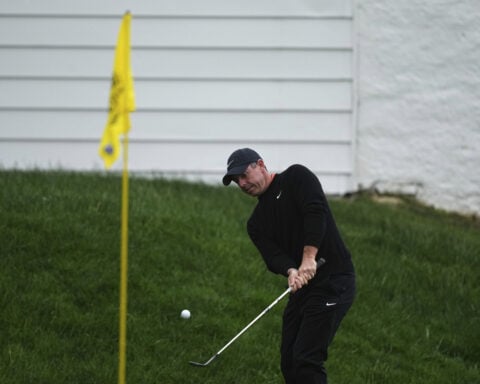 Mitchell shows staying power at soggy Truist with 2nd-round 67; McIlroy 5 strokes off the lead