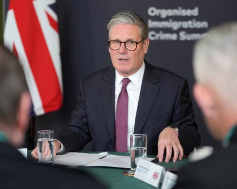 UK plans to end 'failed free market experiment' in immigration