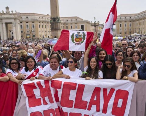 Whoops, waves, tears: Faithful react to Pope Leo's first Sunday blessing in St. Peter's Square
