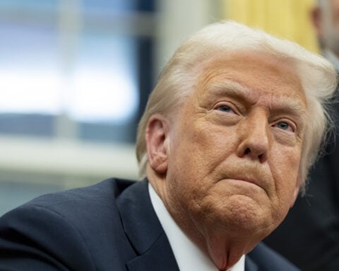 First group of 49 white South Africans leaves for the US after Trump offered them refugee status