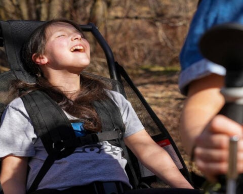 Doctors told a dad his daughter would never walk on her own. He built a way to get her on the trails.