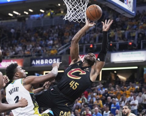 Cavs' Donovan Mitchell questionable for Tuesday's game after reaggravating sprained left ankle