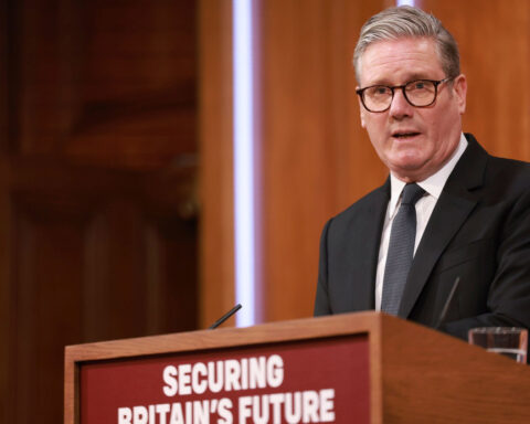 Britain sets out plan to toughen rules on migration, as Starmer combats surge in support for populists