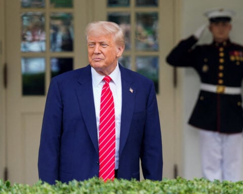 Trump says he may ease sanctions on Syria