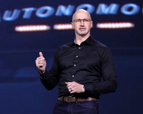 GM hires self-driving company leader as chief product officer