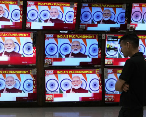 Modi says India has only paused military action after it and Pakistan stop firing at each other