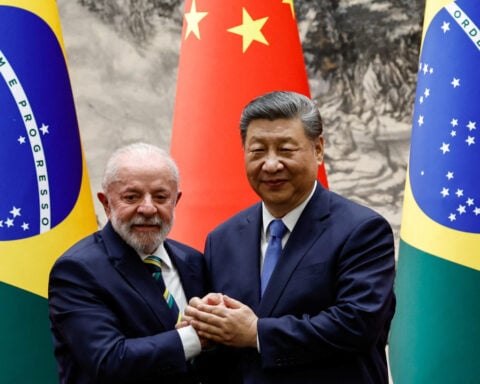 China, Brazil pledge to defend free trade as presidents meet in Beijing