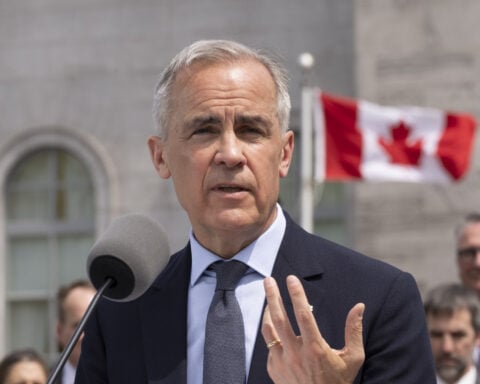 Canadian Prime Minister Carney names a new foreign minister in a Cabinet shake-up